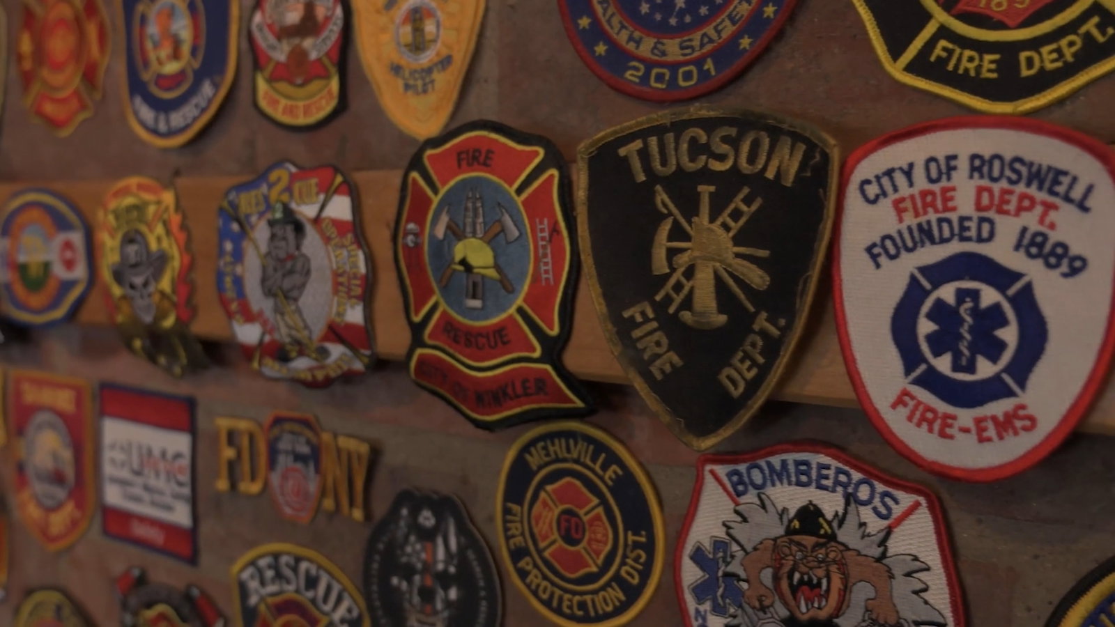Wall of service and agency badges